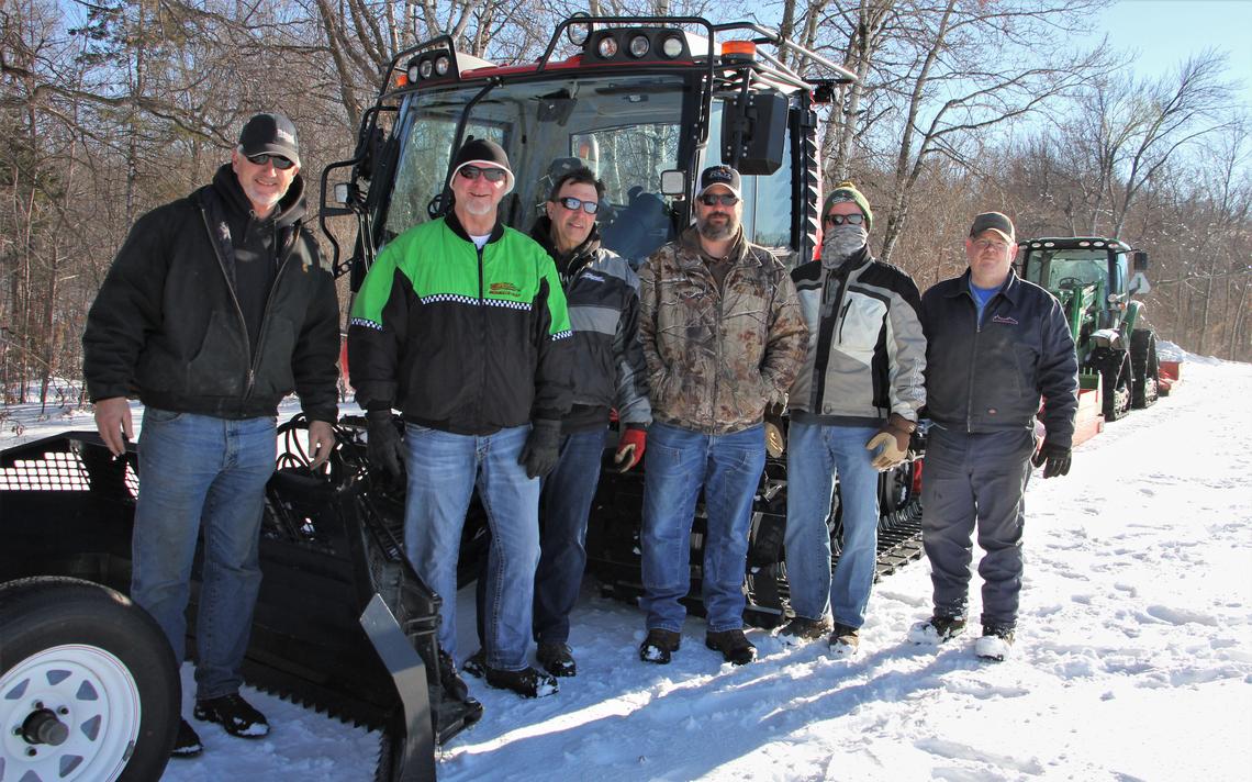 Officers with Pisten Bully